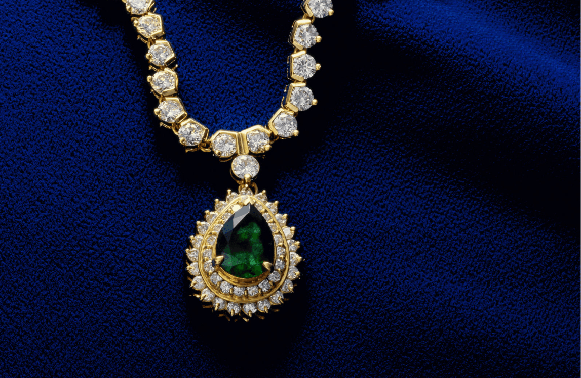 Elegant diamond and emerald necklace