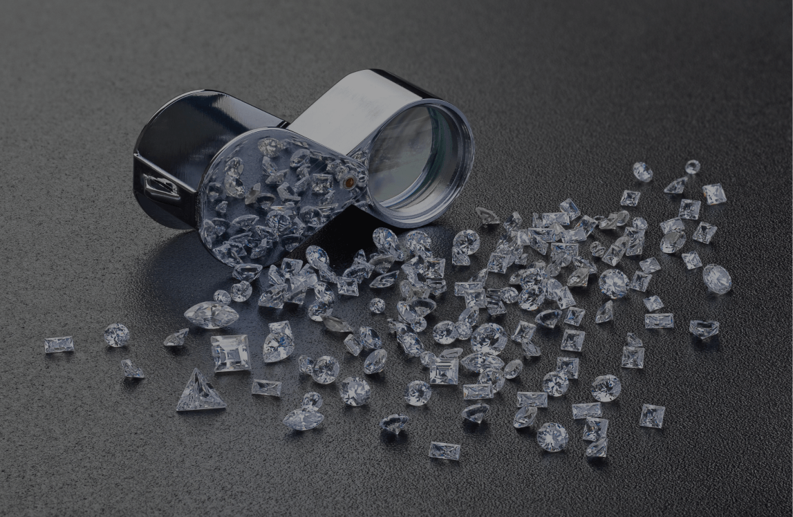 Scattered diamonds on black surface